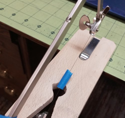 Judy Larson's Cutting Coils Into Jump Rings - , General Education, Jump Rings, Jump Ring, Making Jump Rings, bracing the coil on the bench pin