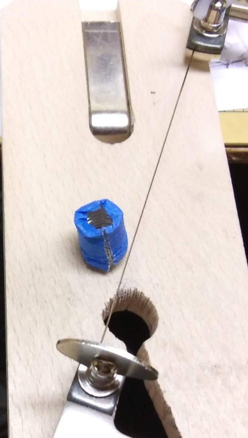 Judy Larson's Cutting Coils Into Jump Rings - , General Education, Jump Rings, Jump Ring, Making Jump Rings, finished cut coil on bench pin