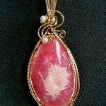 Rhodochrosite pendant wrapped with gold filled wire