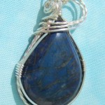 Polished lapis lazuli cabochon