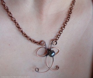 Finished copper butterfly necklace with liver of sulfur finish