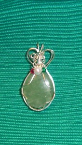 Karren Vitt created this aquamarine pendant for her daughter-in-law: it holds 4 birthstones, including aquamarine for her daughter-in-law's March birthday.