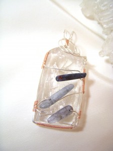 Wire wrapped quartz pendant with kyanite beads