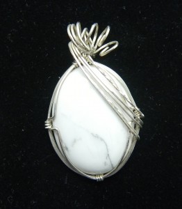 Karen McCoun wrapped this howlite cabochon into a beautiful pendant.