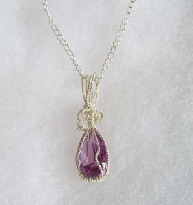 Bess Walters wrapped this Alexandrite CZ stone in twisted silver-plated wire.