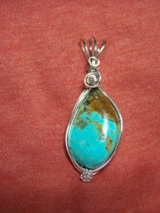 Wire wrapped turquoise pendant in argentium silver wire