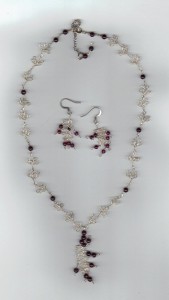 Garnet necklace and earrings set by Ruth Soucek