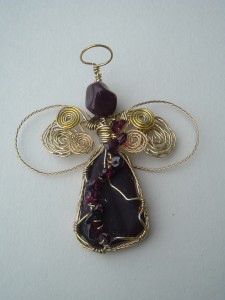 Sheila Mosher's wire wrapped garnet angel with red recycled glass