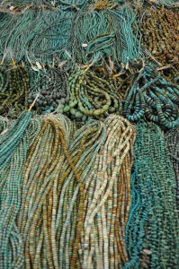 Turquoise bead strands drape the tables at JOGS in Tucson